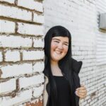 headshot of grace, an intern at emerge