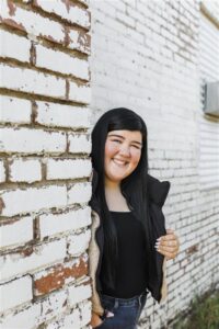 headshot of grace, an intern at emerge